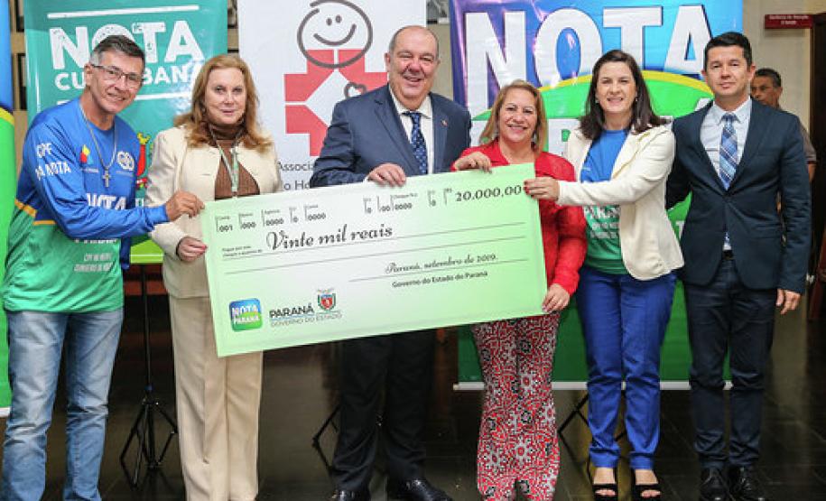 nota parana Premiados de setembro recebem cheque do Nota Paraná